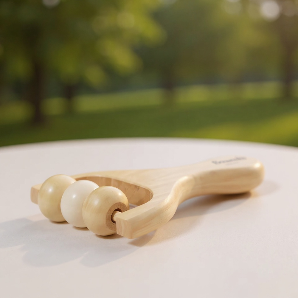 rituel massage jambes baumélis rouleau circulatoire auto-massage microcirculation drainage jambes lourdes jambes légères détente quotidienne réduction gonflements bien-être naturel complément Baume Miracle